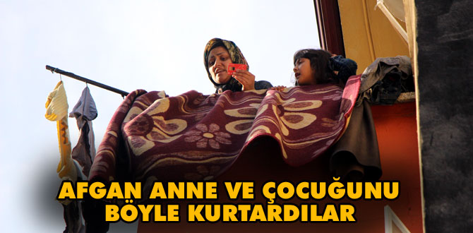 Afgan anne çocuklarını kurtardılar