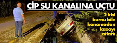 Kontrolden çıkan cip su kanalına uçtu