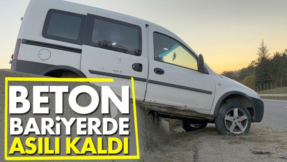 Ticari araç, beton bariyerlerde asılı kaldı: 1 yaralı