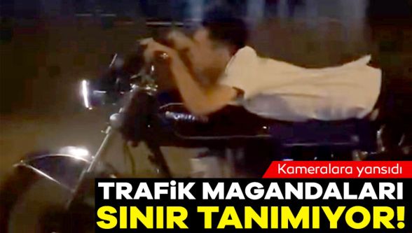 Bolu'da D-100'de motosikletin üstünde yatarak tehlikeli yolculuk yapan magandalar kamerada